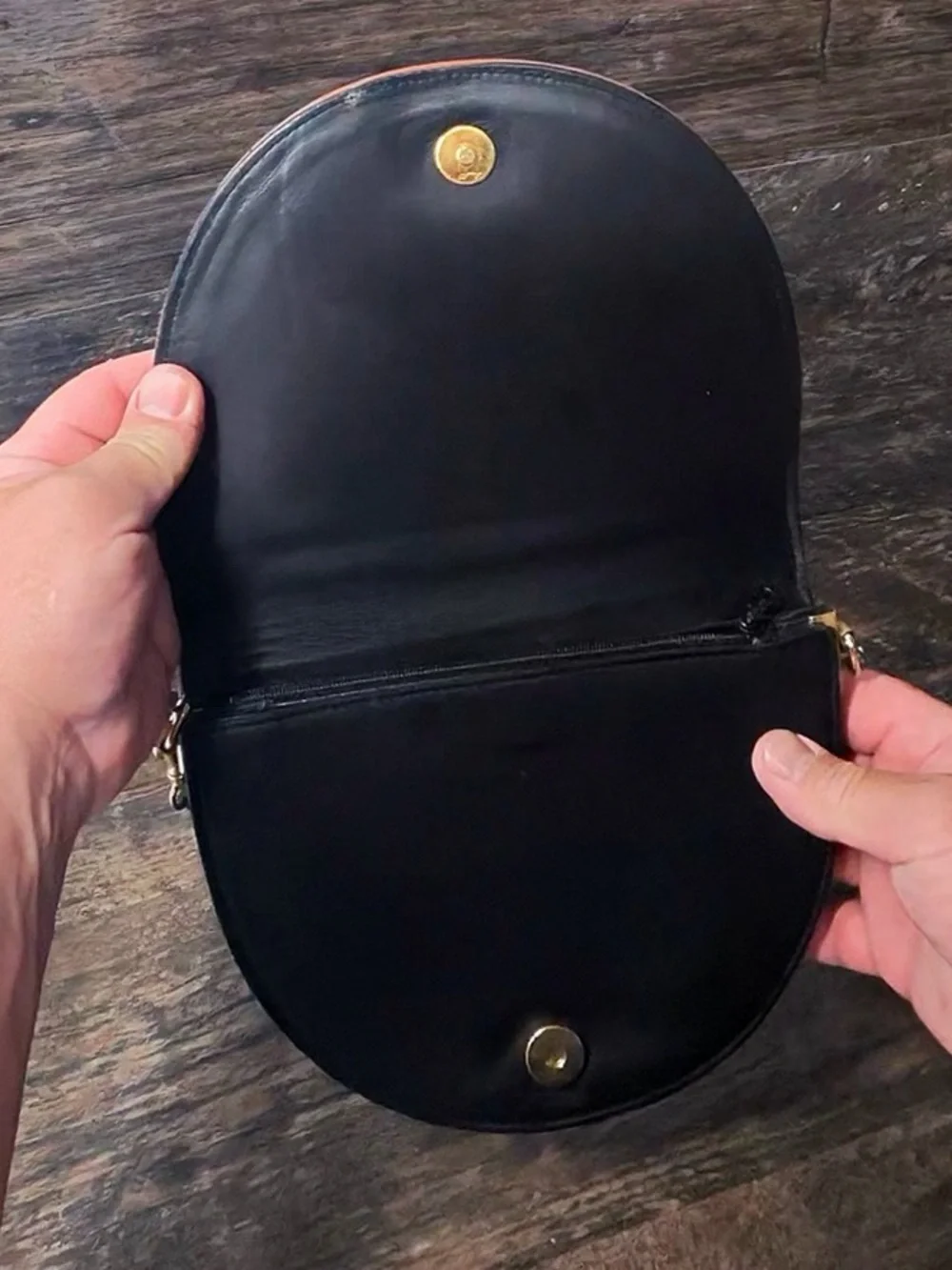 Leather Crescent Crossbody Bag in Black with Brown Trim